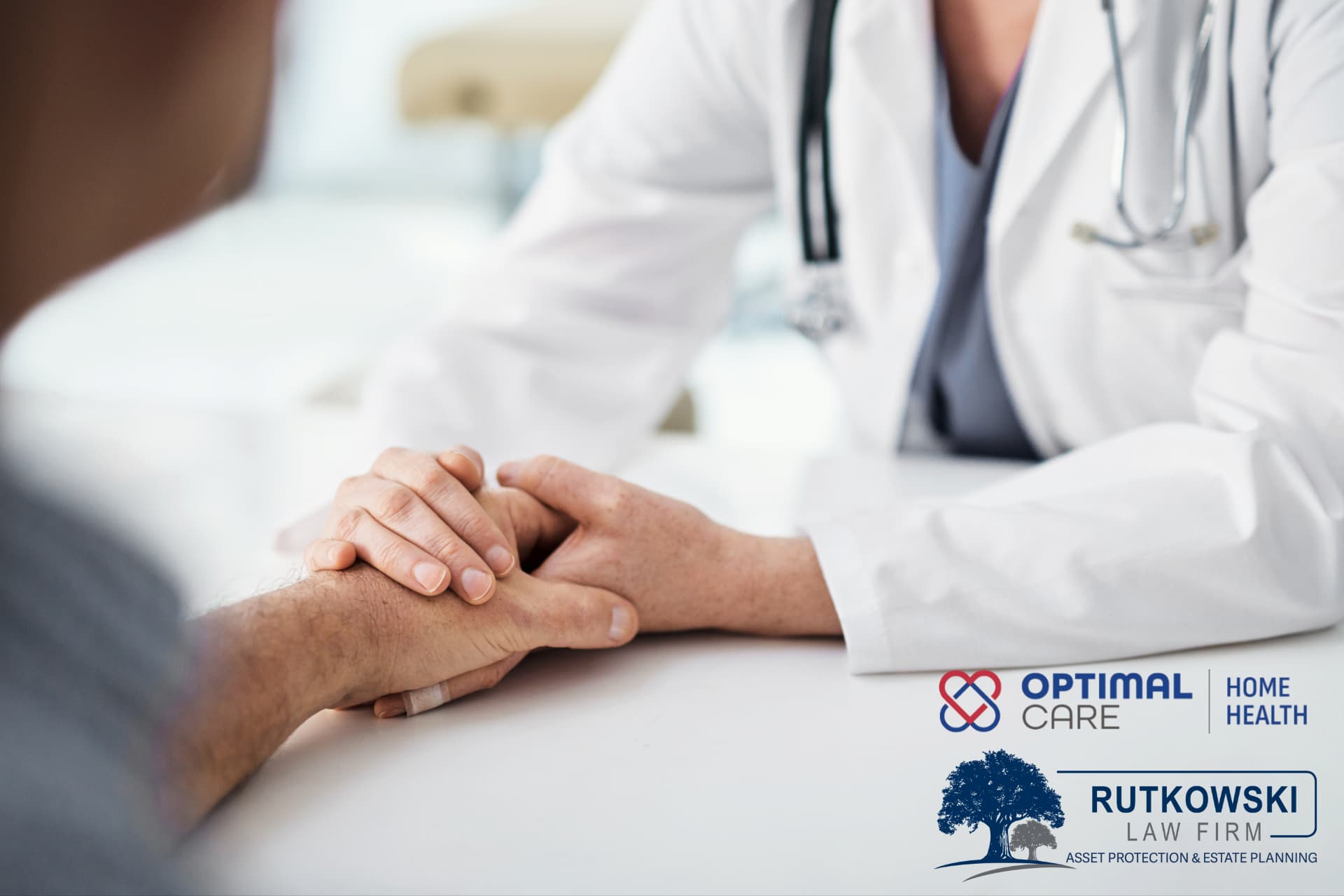 Close up of nurse holding hands with adult