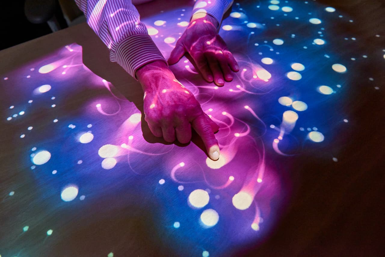 Seniors playing in tovertafel lights